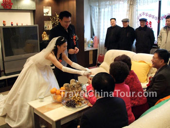 Offering tea at Chinese wedding.