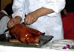 chef cutting beijing duck